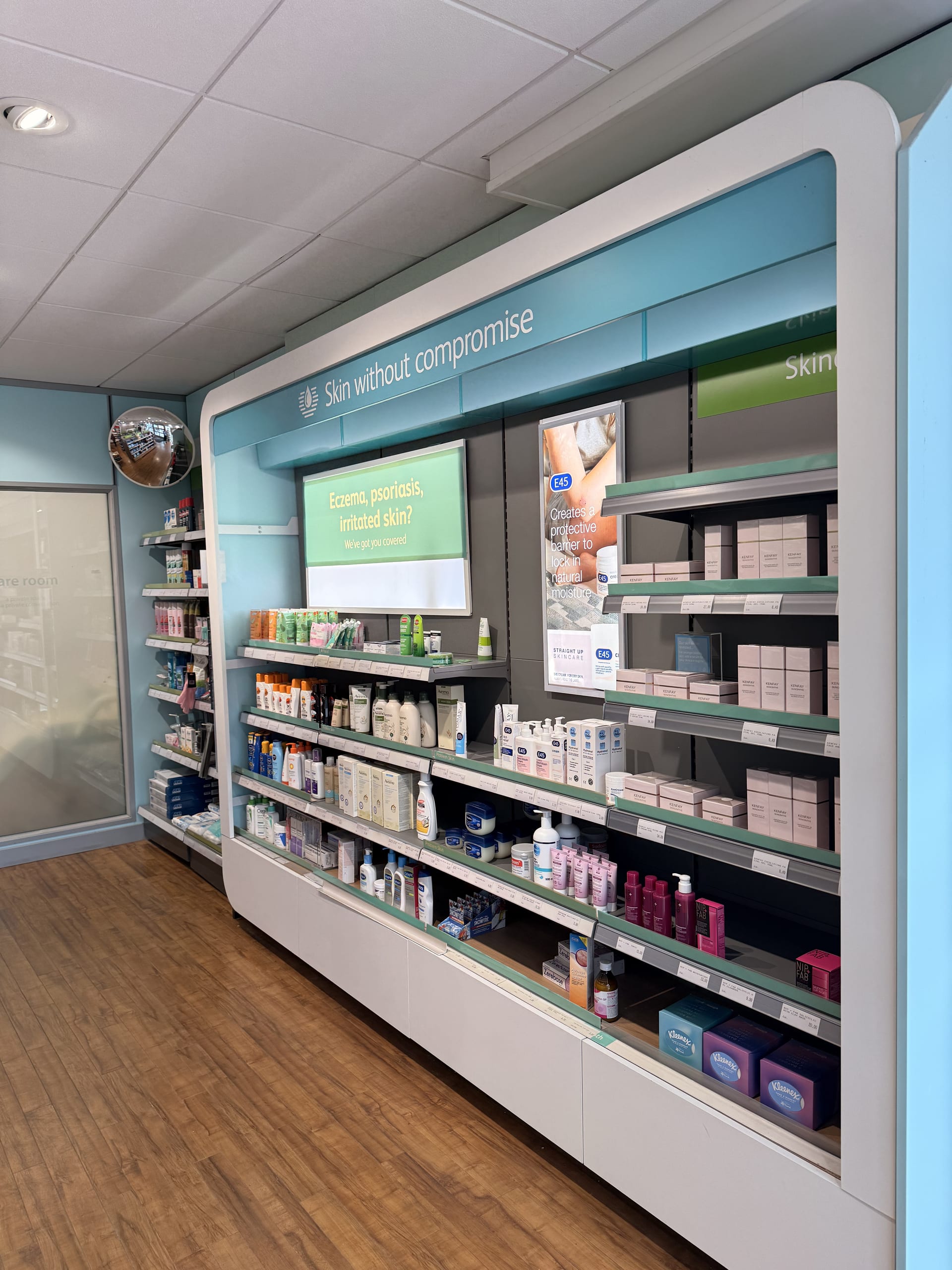 Self-care and women's health shelves inside Medicine Stop, Alfreton.